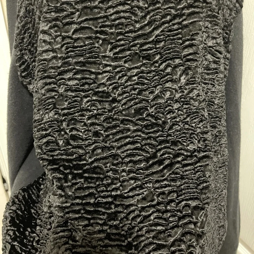 Kate spade black sweater. Looks like Front made with the unique sheep fur.